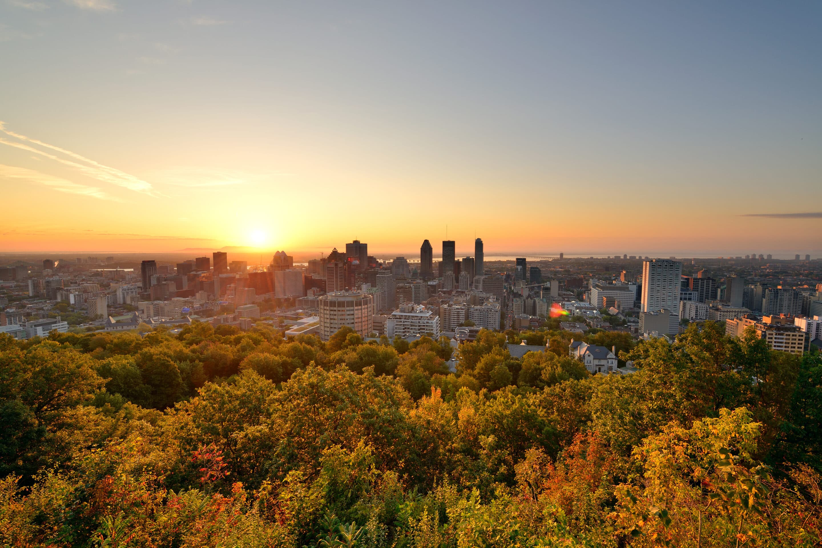 montreal sunrise viewed from mont royal with city skyline morning scaled